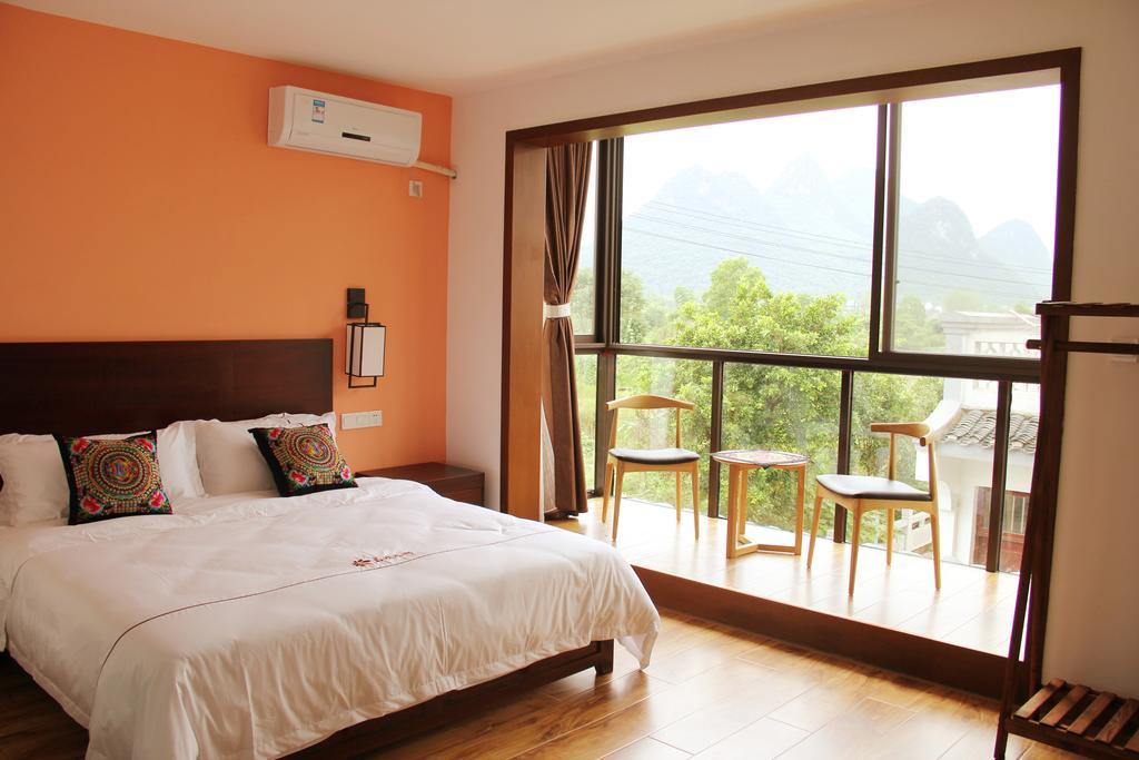 The Flower Hotel Guilin Rom bilde