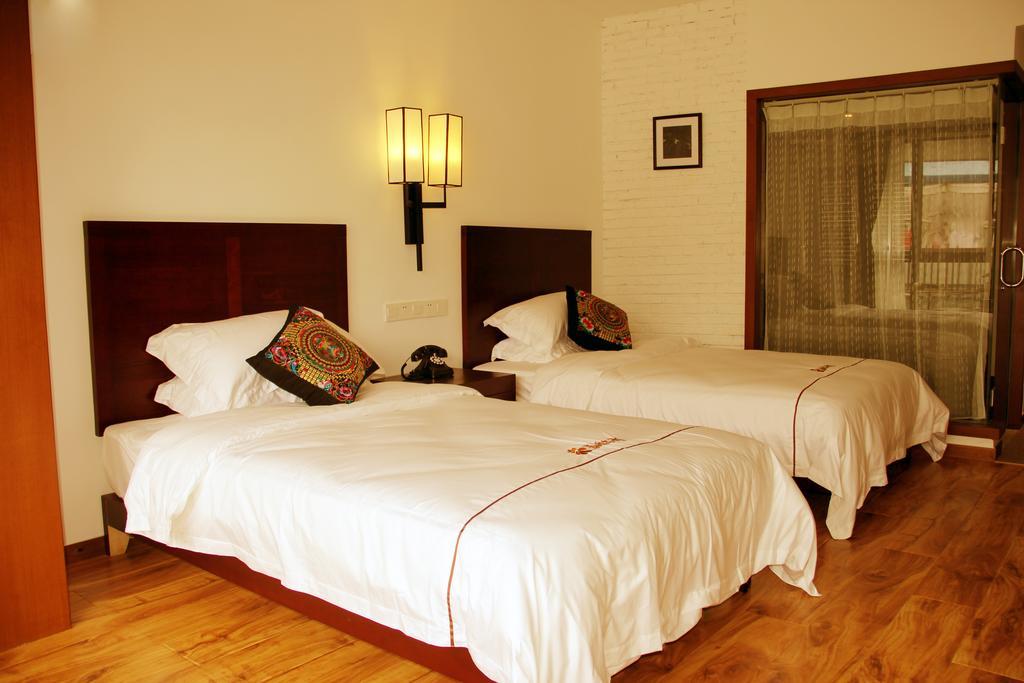 The Flower Hotel Guilin Rom bilde